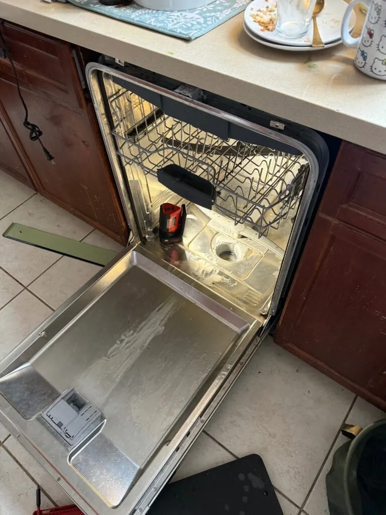 Bosch dishwasher with the bottom panel removed during repair in Las Vegas
