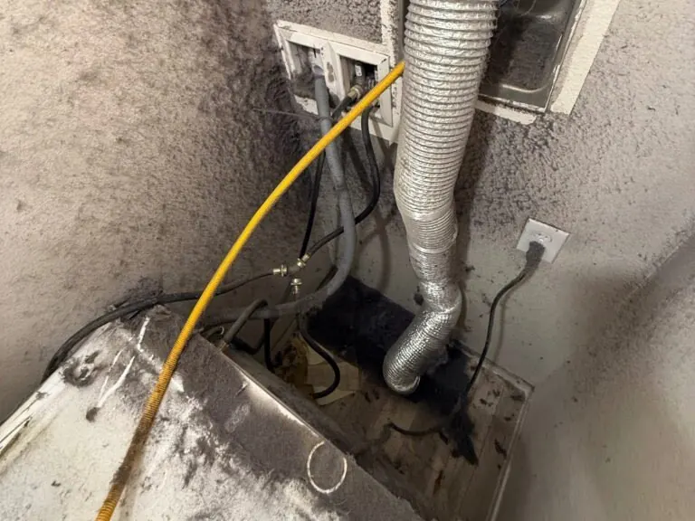 Dryer drum rollers, idler pulley and belt during a dryer repair