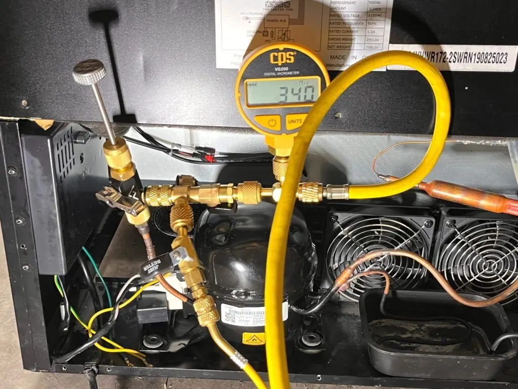 New compressor installed in an Allavino wine refrigerator sealed system