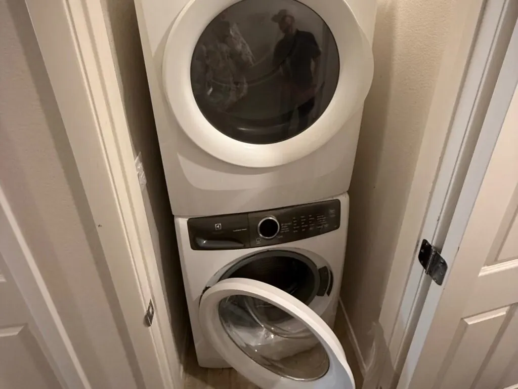 Washer being diagnosed in a Las Vegas laundry room