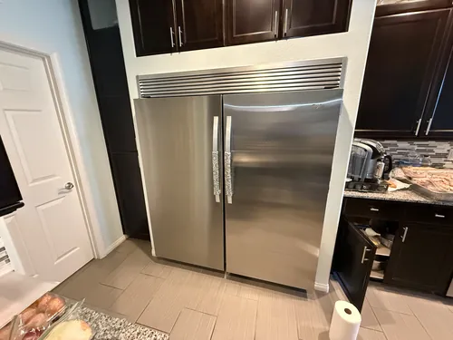 Built-in Whirlpool side-by-side refrigerator in a North Las Vegas kitchen after compressor replacement